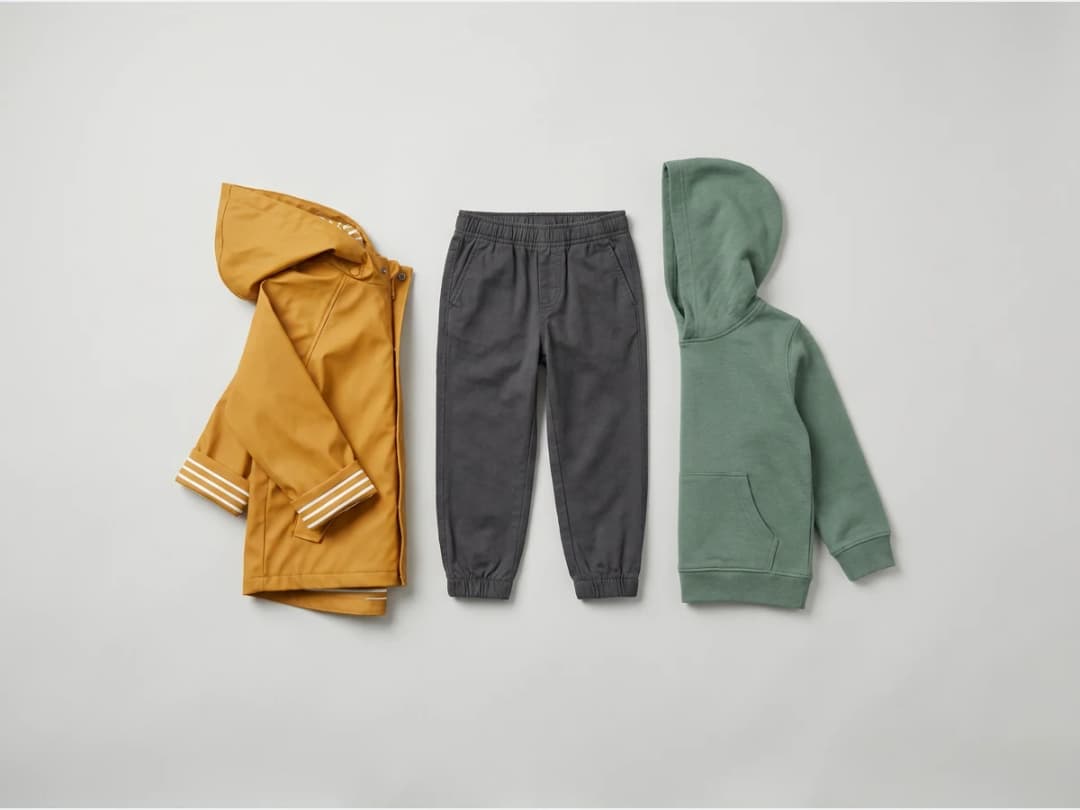 A set of children's pieces designed together, coat, joggers and sweatshirt