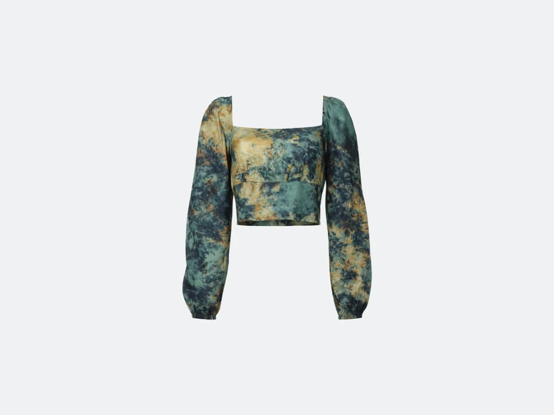 A tie-dye cropped top photographed flat, the only input the chain starts from