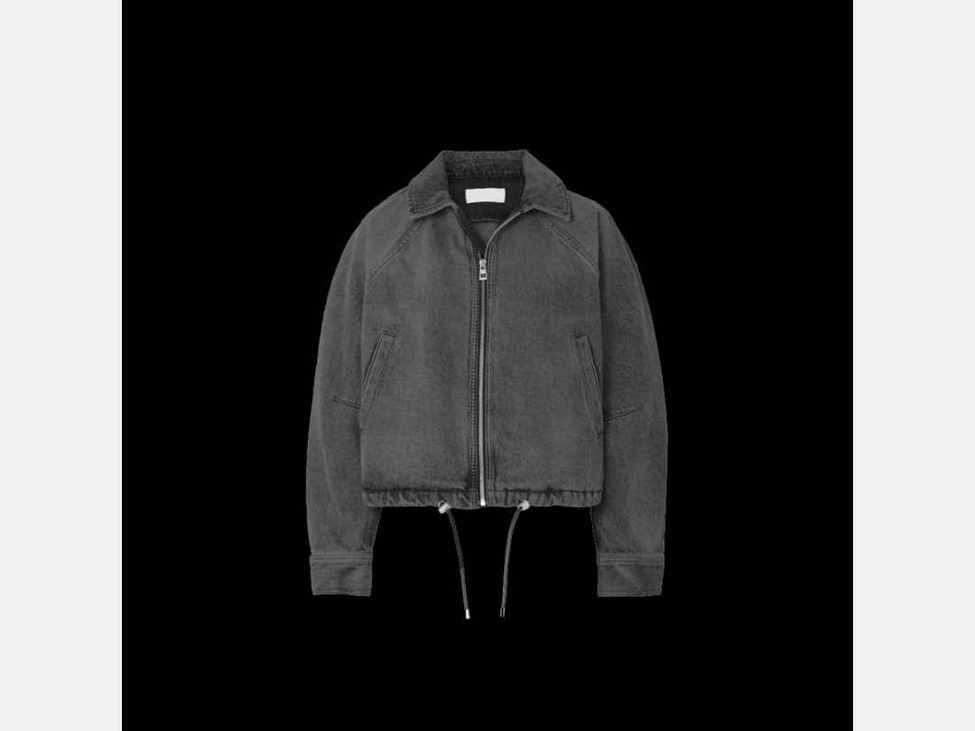 A grey denim jacket photographed flat, the kind of product shot the sketch is read from
